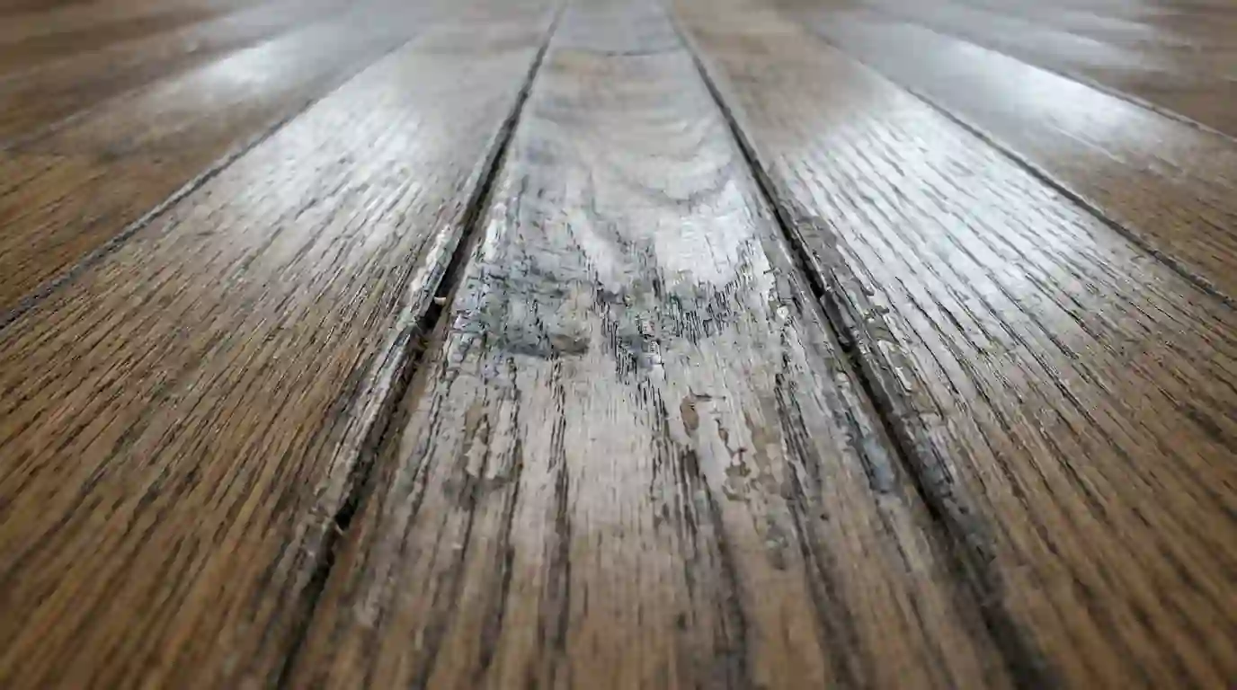 Cupped oak floorboards after water damage